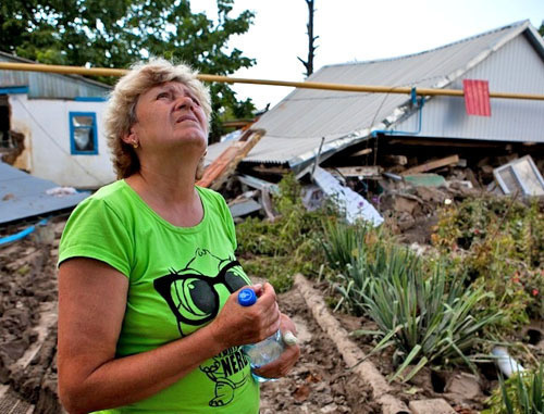 Жительница Крымска, пострадавшая от наводнения. Краснодарский край, 11 июля 2012 г. Фото: Юрий Гречко / Югополис