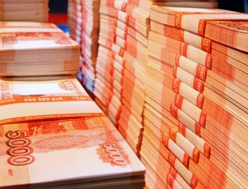 Пачки денег. Фото: http://bezformata.ru
