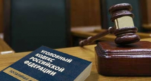 Уголовный кодекс и молоток судьи. Фото: https://mvd.ru/