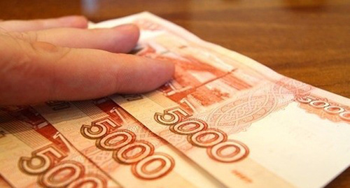 Купюры номиналом 5000 рублей. Фото: http://krasnodar-news.net/img/20140604/595027cded46f86e9012bff5ac7402d1.jpg