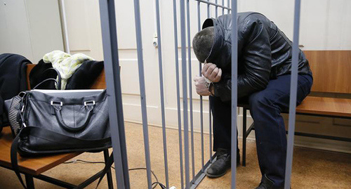 Тамерлан Эскерханов в зале суда. Фото Максима Шеметова, REUTERS