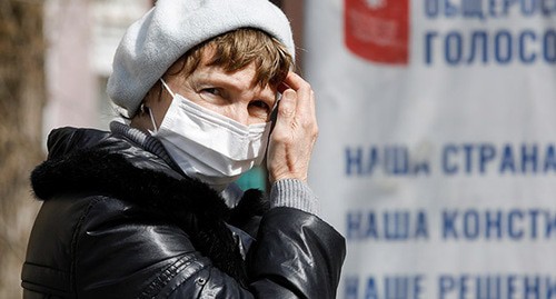 Женщина в защитной маске. Ставропольский край, март 2020 г. Фото: REUTERS/Eduard Korniyenko