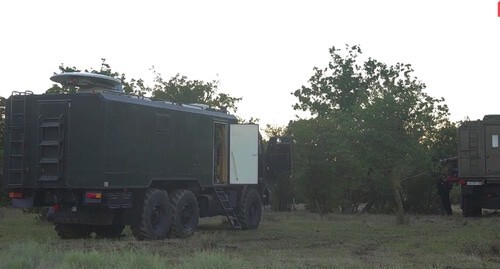 Спецтехника во время проведения  КТО силовиками в лесу неподалеку от села Талги. Кадр видео: Национальный антитеррористический комитет